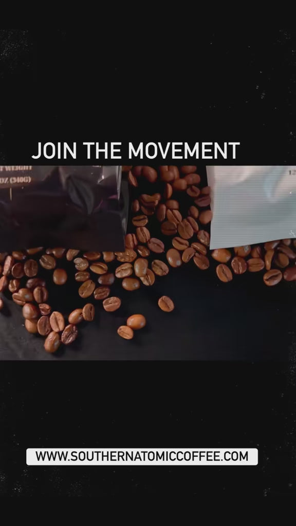 Two Southern Atomic Coffee bags lie on the ground, one Caramel Sweet Potato Pecan Pie and the other Smoked Maple Whiskey Walnut Cake Ice Cream, surrounded by scattered coffee beans, with both labels clearly visible.